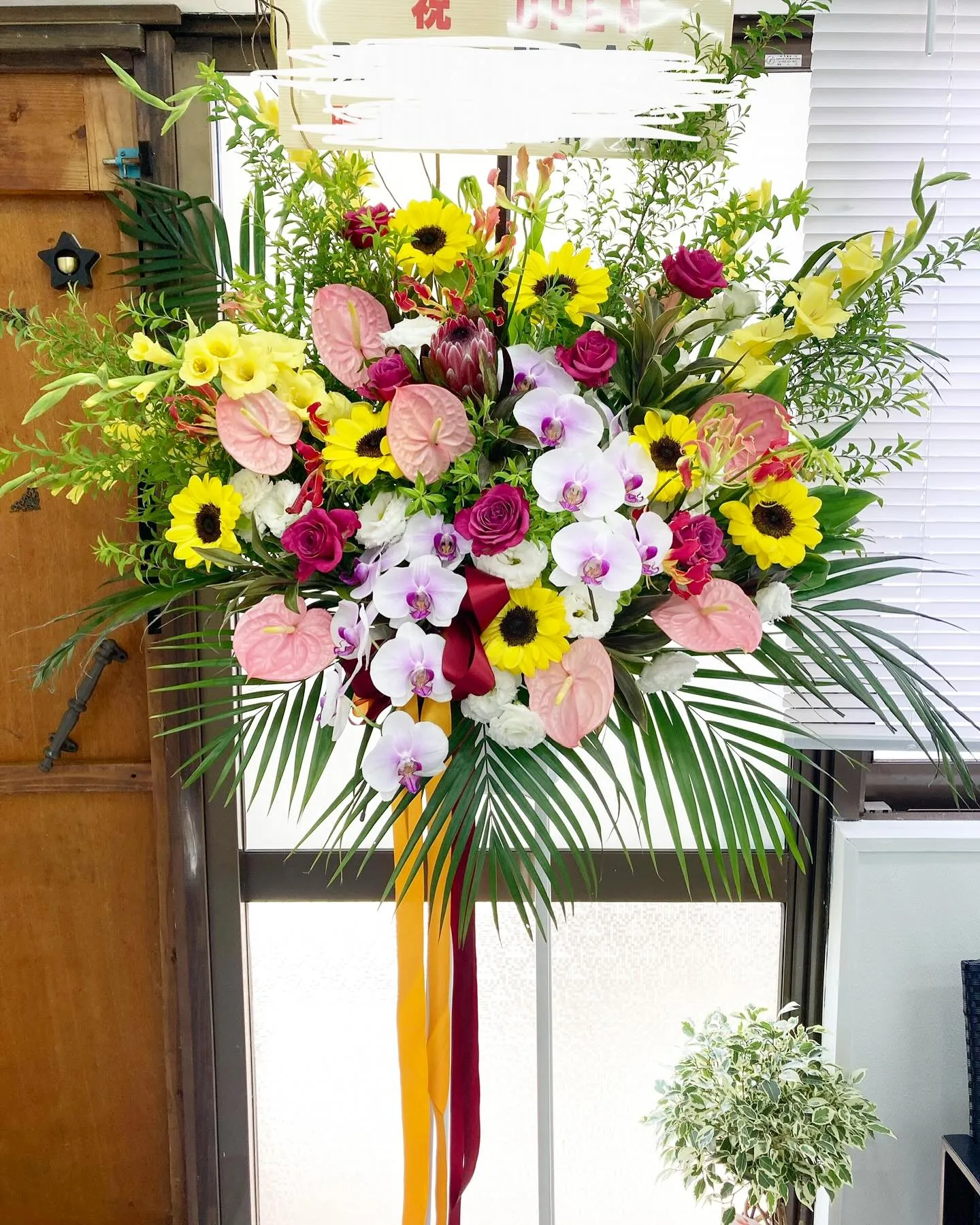 理容室💈✂️開店祝いのスタンド花。